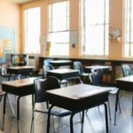 desk in an empty classroom